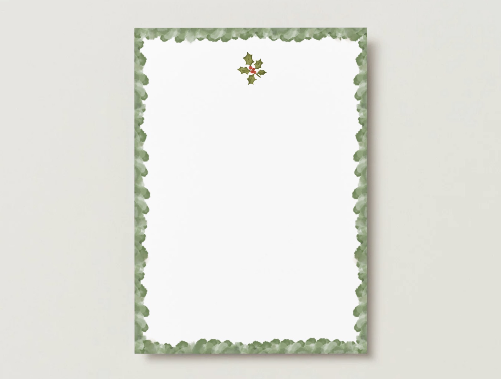 Holly birth flower A7 flat card with a full leafy green holly border on a pale gray background