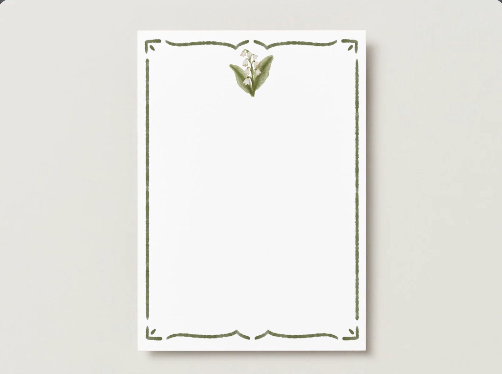 Lily of the valley birth flower A7 flat card with a scrolling green border on a pale gray background