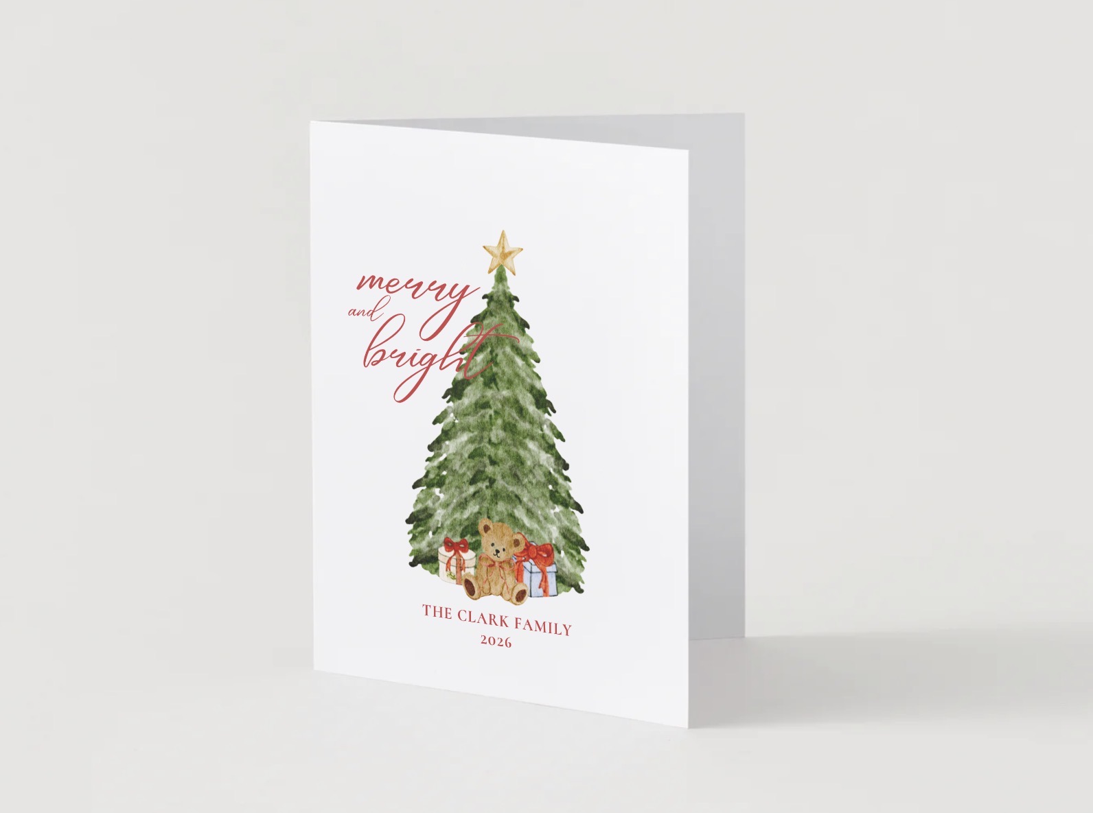 Semi-custom Christmas card for the Clark Family with a hand-drawn tree, teddy bear and presents, personalized with family name and year